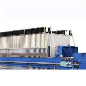 FILTER CLOTH TENSIONING, VIBRATION AND DISCHARGE DEVICE